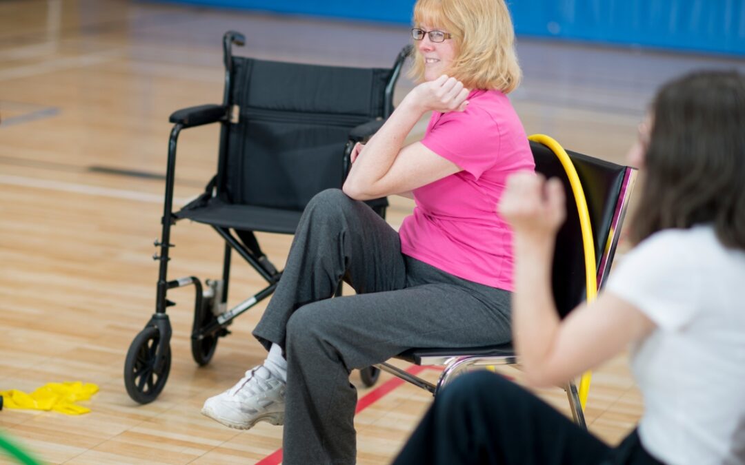 a person in a wheelchair doing exercise